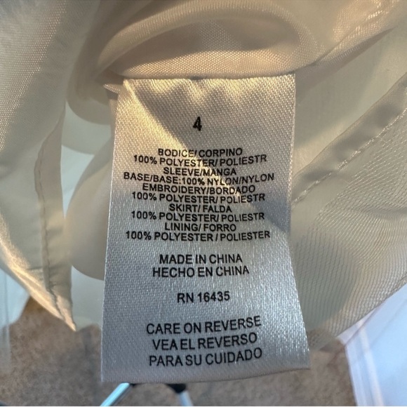 Biscotti Flower Girl White Dress with Lace Shoulders & Matching Bow Headband - Picture 14 of 14